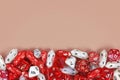 Different red roleplaying RPG dice at bottom of beige background Royalty Free Stock Photo