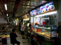 Different restaurants in a typical Singapore food court or Hawker Royalty Free Stock Photo