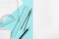 Different rulers, pencil and compass on color background, flat lay. Space for text