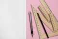 Different rulers, pencil and compass on color background, flat lay. Space for text Royalty Free Stock Photo