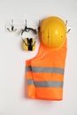Different safety equipment hanging on wall