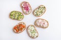 Different sandwiches with microgreens and vegetables on a white background Royalty Free Stock Photo