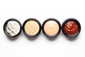 Different sauces in assortment in black sauces Royalty Free Stock Photo