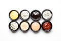 Different sauces in assortment in black sauces Royalty Free Stock Photo
