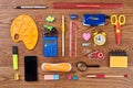 Different school supplies on wooden background. Royalty Free Stock Photo