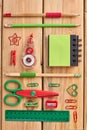 Different school supplies on the wooden background. Royalty Free Stock Photo