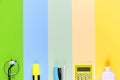 Different school tools on colorful paper copy space background Royalty Free Stock Photo