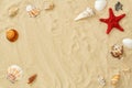 Different seashells frame on beach sand. Summer concept with seashells and starfish on beach sandy background. Design Royalty Free Stock Photo