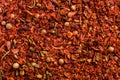 Different seasonings mixture of peppers peas, red pepper powder, background Royalty Free Stock Photo