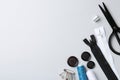 Different sewing supplies on white background, flat lay. Space for text Royalty Free Stock Photo