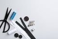 Different sewing supplies on white background, flat lay. Space for text Royalty Free Stock Photo
