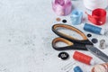 Sewing tools forming background with copy space Royalty Free Stock Photo