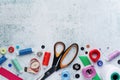 Sewing tools forming background with copy space Royalty Free Stock Photo