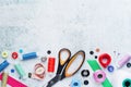 Sewing tools forming background with copy space Royalty Free Stock Photo