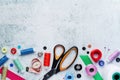 Sewing tools forming background with copy space Royalty Free Stock Photo