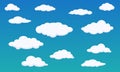 Different shape cartoon white clouds on blue background. Vector decoration element. Royalty Free Stock Photo