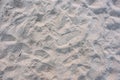 Different shoe prints in sand. Royalty Free Stock Photo