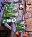 Different signs for tourist in downtown of Prague. Tourist info. wc. toilette Royalty Free Stock Photo