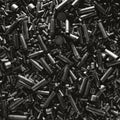Different size bullet shells on the black ground. War concept. production of ammunition at the factory. brass bullet shell, Royalty Free Stock Photo