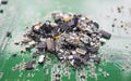 Different size SMT components pile thrown on a PCB.