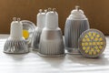 Different sizes of cooling for LED GU10 bulbs Royalty Free Stock Photo