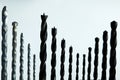 Different sizes of drill bits arranged in a row on light background Royalty Free Stock Photo