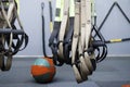 Different sizes of kettlebells weights lying on gym floor. Equipment commonly used for crossfit training at fitness club