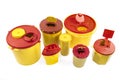 Different sizes of Medical waste bins 1.3, 2, 3, 5 liter. Yellow biohazard medical contaminated and sharp clinical waste