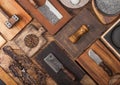 Different sizes and shapes kitchen chopping boards on wooden background with meat hatchets, fork and knife and other utensils. Top Royalty Free Stock Photo