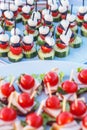 Snacks on white plates. Royalty Free Stock Photo