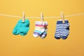 Different socks for baby on laundry line Royalty Free Stock Photo