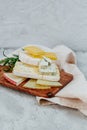 Different sorts of cheese, blue, brie, camembert and other with walnuts