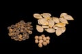 Different sort of seeds on a black background. Royalty Free Stock Photo