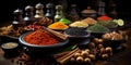 Different spice powder bowls and bottles with cinnamon