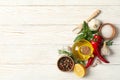 Different spices and herbs on wooden background, top view Royalty Free Stock Photo