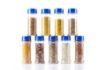 Different spices jars and pepper mill Royalty Free Stock Photo