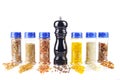 Different spices jars and pepper mill Royalty Free Stock Photo
