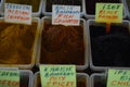 Different spices in plastic boxes in bazaar turkey antalya