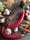 Different spices on rocked table.