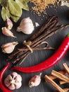 Different spices on rocked table.