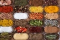 different spices in small containers