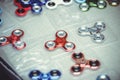 Different spinners lie on the table, sale