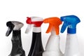 Different sprayers on plastic bottles of various household cleaning agent Royalty Free Stock Photo