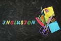 Different stationery on blackboard and word INCLUSION, flat lay Royalty Free Stock Photo