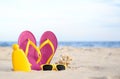 Different stylish beach objects on sand. Space for text Royalty Free Stock Photo