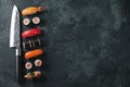 Different Sushi with Japanese knife. flat lay. Royalty Free Stock Photo