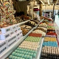 Different sweets on the counter are laid out all the colors of the rainbow as much as the saliva flows from jelly
