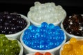 Different tapioca pearls for bubble tea. Bubble tea ingredients arrangement in bowls