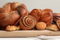 Different tasty freshly baked pastries on table