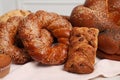 Different tasty freshly baked pastries on table